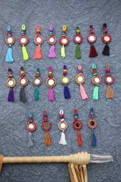 Shorty Tassel Mirror Charms, 1 Piece - ShopWomanShopsWorld.com. Bone Beads, Tassels, Pom Poms, African Beads. Tassel Mirror, Decorate Lampshade, Mirror Charms, Charms Keychain, Potters Clay, Main 1, Keychain Purse, Jewerly Making, Bohemian Accessories