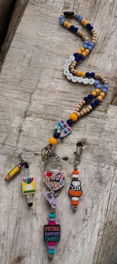 My daughter is making bracelets, anklets, earings, keychains, and lanyards. She is trying to earn money for books, records, and to save. Average length if a lanyard is 34" if you would like it shorter or longer send a message.  Badge Reel has a clasp on it and can be worn separately.  Bead bars on badge reel can be changed out and more sold separately. Please message with style you want: teacher nurse holiday season other professions Can do many different colors, charms, and beads. Novelty Adjustable Badge Holders For School, Handmade Multicolor Craft Supplies For School, Multicolor Handmade Craft Supplies For School, Personalized Fun Craft Supplies For Teacher Appreciation, Multicolor Craft Supplies For End Of School Year, Personalized Multicolor Lanyards For Teacher Appreciation, Personalized Multicolor Badge Holders For School, Handmade Multicolor Craft Supplies For Teacher Appreciation, Multicolor Handmade Craft Supplies For Teacher Appreciation