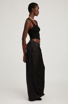 A chic wide leg pant made from smooth silk charmeuse with a slight sheen. Cut in a wide leg silhouette and fitted with elongating pintucks down the front, these pants are designed with a comfortable stretchy elastic waistband for easy, pull-on wear. A chic style for day or night, style these with the matching cropped silk cami or a classic button down shirt. COLOR: Black Brandy Jacket, Night Style, Black Wide Leg Pants, Frank & Eileen, Silk Cami, Suede Fashion, Denim Hat, Silk Trousers, Womens Cashmere