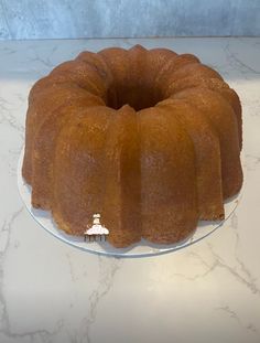 a bundt cake sitting on top of a white plate