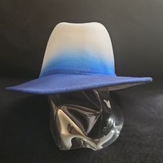 New Ombre Hat. Very Stylish. Never Worn. White Fedora Felt Hat For The Beach, White Fedora Felt Hat For Beach, Blue Felt Hat With Flat Brim For Spring, Blue Flat Brim Felt Hat For Spring, Trendy Blue Hat With Flat Brim, Trendy Blue Brimmed Fedora, Blue Spring Felt Hat With Curved Brim, Blue Flat Brim Fedora For Winter, Trendy Adjustable Blue Fedora