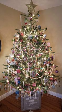 a decorated christmas tree in a living room