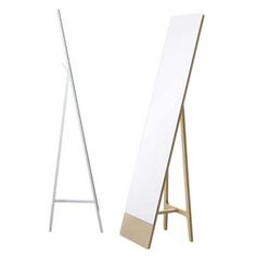 an easel with a mirror on it and a wooden stand next to each other