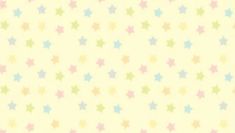 a yellow background with multicolored stars on it