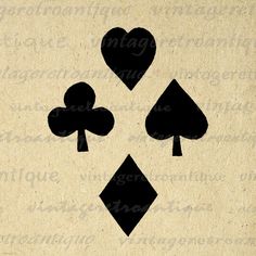 four card suits with hearts and spades in black against a beige background that has words written below it