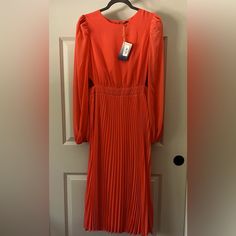 Jealous Tomato Coral (Looks More Orange In Picture). Medium, Nwt, Never Worn. Small Side Cut Outs. Fitted Orange Pleated Dress, Fitted Orange Pleated Midi Dress, Orange Pleated Midi Dress For Spring, Spring Orange Pleated Maxi Dress, Pleated Orange Maxi Dress For Spring, Side Cuts, Medium Long, Cut Outs, Color Orange