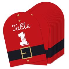 red santa hat shaped placemats with the number one on them