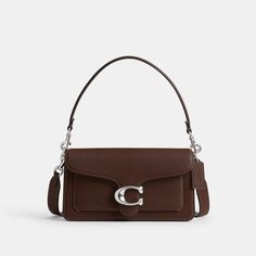 A modern take on an archival 1970s Coach design our structured Tabby shoulder bag is crafted of polished pebble leather. Finished with our Signature hardware for an iconic touch the compact 26 features two detachable straps to carry by hand style as a short shoulder bag or wear crossbody. | Coach Tabby Shoulder Bag 26 - Women's - Silver/maple Coach Tabby 26, Coach Tabby Shoulder Bag, Tabby Shoulder Bag, Coach Tabby, Hand Style, Structured Bag, Structured Design, Polished Pebble, Large Wallet