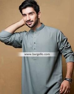 <ul> <li>Color: Cadet grey</li> <li>Scrumptious kurta features awesome embroidery on collar</li> <li>Complemented with matching shalwar</li> </ul> <p><br /><br /><strong>Additional Accessories:</strong><br />Peshawari Sandal: <strong>US$50</strong><br />Men's Shawl: <strong>US$50</strong></p> Gray Traditional Wear For Eid, Traditional Gray Wear For Eid, Gray Embroidered Kurta For Eid, Embroidered Gray Kurta For Eid, Traditional Gray Kurta For Eid, Fitted Gray Kurta For Eid, Gray Fitted Kurta For Eid, Gray Cotton Kurta For Eid, Gray Salwar Kameez For Eid