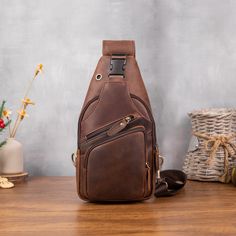 Crazy Horse Leather Chest Bag for Men's Leisure Retro Style Crossbody Bag Top Layer Cowhide Shoulder Bag Commuter Outdoor Leisure Bag PRODUCT INFORMATION --------------------------------------------- --Product Size: 34x9x17 cm--13.38x6.69x3.54 inch; --Item Weight:0.6 kg/1.32lb --Color: Deep Brown --High-Quality Stitching This bag has an adjustable shoulder strap. On the back of the crossbody bag are two hooks for both the left and right shoulders ✔The ultimate grab-and-go daypack, this brown lea Brown Crossbody Chest Bag For Outdoor, Outdoor Chest Bag With Adjustable Strap, Durable Chest Bag For Outdoor Activities, Brown Chest Bag With Zipper For Outdoor, Brown Chest Bag With Zipper Pocket For Outdoor, Brown Portable Backpack For Outdoor, Rectangular Outdoor Chest Bag With Anti-theft Pocket, Leather Chest Bag With Anti-theft Pocket For Outdoor Activities, Leather Chest Bag With Anti-theft Pocket For Outdoor