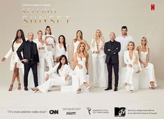 the real housewives cast is posing for a group photo in their white outfits and tuxedos