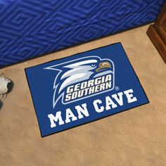 a man cave door mat with an eagle on it