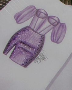 a drawing of a purple handbag on top of a piece of paper