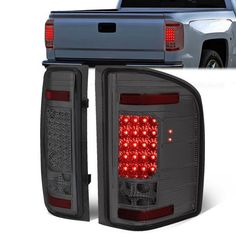 the tail lights and taillights of a silver pickup truck with red leds on