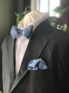 "* Simply Me * Gentlemen * Est. 2017 LLC * \"SIMPLY ME * GENTLEMEN::  BOW TIE AND COORDINATING POCKET SQUARE\" Dressed up or dressed down is how you can wear my handmade bow ties for all the men in your life. Be Dapper, Be Classy, Be a Gentleman is what my bow ties represent.  So Wear them Confidently, and Wear them with Pride.    Bow ties will never go out of style, but my goal is to have them integrated into menswear for everyday wear.  \"DESCRIPTION AND DETAILS\" You can look professional, st Elegant Blue Suit With Pocket Square, Blue Suit And Tie Accessories For Wedding, Blue Classic Wedding Suit And Tie Accessories, Semi-formal Blue Suit And Tie Accessories With Bow Tie, Blue Semi-formal Suit And Tie Accessories With Bow Tie, Blue Semi-formal Suit And Tie With Bow Tie Accessories, Blue Semi-formal Suit And Bow Tie Accessories, Blue Pocket Square For Wedding, Blue Spring Wedding Suit