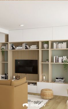 a living room filled with furniture and a flat screen tv on top of a wooden shelf