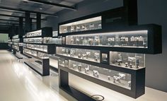 a room filled with lots of glass cases