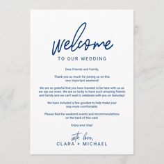 a blue and white wedding welcome card