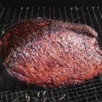 a piece of steak on a white background