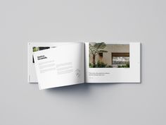 an open brochure showing the front and back pages of a house with palm trees