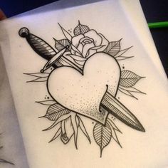 a drawing of a heart with two swords on it