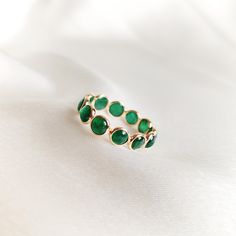 This stunning ring is set in 14k Solid Yellow Gold with Natural Emerald with utmost precision. It is an unique dainty gemstone ring for nearly every occasion and is completely hassle-free jewelry. 🔷ABOUT GEMSTONE:  Emerald is often associated with love and romantic relationships. It is believed to promote love, loyalty, and unity, making it a popular choice for engagement and anniversary jewelry. Emerald is often associated with abundance and financial success. It is believed to attract prosper Elegant Emerald Ring With Smooth Bezel For Anniversary, Elegant Stackable Emerald Rings With Bezel Setting, Elegant Green Stackable Rings With Bezel Setting, Elegant Emerald Ring With Smooth Bezel, Round Emerald Ring With Smooth Bezel For Anniversary, Anniversary Green Ring With Smooth Bezel, Anniversary Round Emerald Ring With Smooth Bezel, Emerald Jewelry With Bezel Setting In Round Band, Adjustable Emerald Ring With Bezel Setting