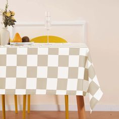 a table with a checkered cloth on it