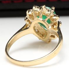 3.00 Carats Natural Emerald and Diamond 14K Solid Yellow Gold Ring Suggested Replacement Value: $6,200.00 Total Natural Green Emerald Weight is: 2.25 Carats (transparent) (Oil/Resin Treated) Emerald Measures: 9 x 7mm Natural Round Diamonds Weight: .75 Carats (color G-H / Clarity SI1-SI2) Ring total weight: 3.8 grams Disclaimer: all weights, measurements and colors are approximate and may vary slightly from the listed dimensions or as seen in the image. All pictures are magnified to show the smal Formal Pear-shaped Prong Setting Cluster Ring, Formal Gold Emerald Ring Gia Certified, Formal Pear-shaped Emerald Ring With Halo Setting, Formal Gia Certified Gold Emerald Ring, Elegant Collectible Emerald Ring With Prong Setting, 14k Gold Pear-shaped Cluster Ring For Formal Occasions, Formal Cluster Emerald Ring With Prong Setting, Formal Yellow Gold Emerald Ring Marquise Cut, Yellow Gold Emerald Pear-shaped Ring For Anniversary