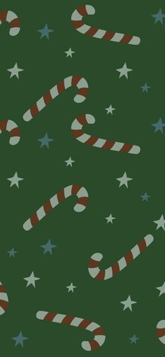 candy canes and stars on a green background