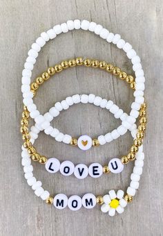 Mama Bracelet / Mom Bracelet / Love You Mom Bracelet / Mama Heishi Bracelet / Bracelet for Mom / Mothers Day Bracelet Stack Flower Bracelet - Etsy Dainty White Beaded Bracelets For Valentine's Day, White Dainty Beaded Bracelets For Valentine's Day, Everyday White Heart Bracelet With Letter Beads, Dainty White Stretch Bracelet As Gift, Personalized White Heart Bracelet For Everyday Wear, Personalized White Heart Bracelet For Everyday, White Name Bracelet Bangle For Friendship, White Dainty Name Bracelet For Friendship, Dainty White Name Bracelet For Friendship