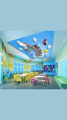 this is a children's playroom with colorful furniture and decorations on the ceiling