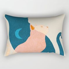 a rectangular pillow with an image of a cat on it's back and moon in the background