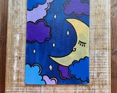 a painting of a moon and clouds in the night sky