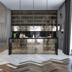 a modern kitchen with marble counter tops and herringbone flooring, along with hanging lights