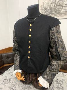 Medieval noble Double coat , made from multi color  brocket  and  black cotton,  with metal buttons. You can wear it in different occasions like renaissance fairs or simple costume parties.   If you're not sure which size to choose, specify your measurements in the Note to Seller section and you will be sent the best size for you. If you have any questions or you want something that is not available in our shop, let us know in a private message. Black Brocade Long Sleeve Outerwear, Medieval Style Black Outerwear With Buttons, Black Historical Design Outerwear For Costume, Medieval Noble, Festival Clothes, Costume Parties, Easy Costumes, Historical Costume, Macedonia