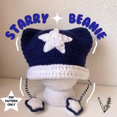 a crocheted hat with stars on it and the words starry beanie written below