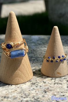 Feel the regal charm and magical aura of our lapis lazuli rings. Perfectly designed for those who appreciate the finer things in life, these rings capture the essence of elegance and the power of nature. #handmade#jewelry#handmadejewelry#wirewrap#wirewrappedjewelry#wire#ring#ringsjewelry#Lapisring#bohostyle#Spring/Summer#wirework#Beach style Wrapped Rings, Rings Handmade, Power Of Nature, Lapis Lazuli Ring, Wire Ring, Wire Rings, Wire Wrapped Rings, Ring Unique, Wrap Rings