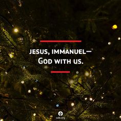 the words jesus, immanuel - god with us are illuminated by christmas lights