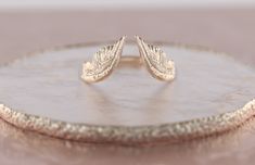 Fab and Sophisticated Angel Wings band in Bohemian Chic style. It has a comfortable fit inside the shank and you won't want to take it off! About this item: -Available in 10K/14K/18K gold in Rose/Yellow/White colors PLEASE NOTICE: This price is for the ring's sizes up to 8, if you need a bigger size > contact us for price & details! Please allow up to 1-2 weeks for production, as each item is made to order! You may also like: https://www.etsy.com/listing/777502252/pink-sapphire-engagement V Wedding Band, Wings Band, Bohemian Chic Style, Nature Wedding Ring, Wing Ring, Angel Wing Ring, Wedding Band Gold, Angel Ring, Celestial Ring