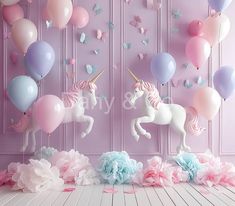 an image of a unicorn party scene with balloons and confetti on the floor