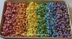 a pan filled with lots of different colored cereal