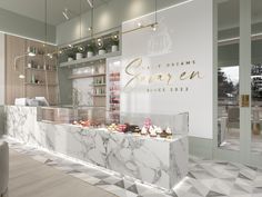 the interior of a store with marble counter tops