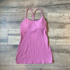 Super Cute (Never Worn) Dusty Rose Color Old Lululemon Tank Top. This Is Size 4, Built In Bra, And Perfect Condition! Sleeveless Pink Top For Pilates, Pink Bra Friendly Top For Pilates, Bra Friendly Pink Tops For Pilates, Pink Workout Tops With Built-in Bra, Pink Bra Friendly Top For Training, Pink Bra-friendly Top For Training, Fitted Pink Top For Pilates, Pink Fitted Go-dry Tank Top, Fitted Pink Go-dry Tank Top