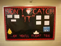 a bulletin board on the wall that says don't catch it or you'll float too