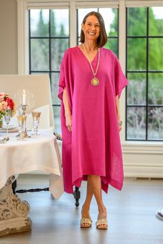 Made in 100% washed linen that is soft and drapes beautifully, our new kaftan can be worn alone, as a yoga or swim cover up, as a tunic over our 100% linen tanks and dresses, or even over a cami and your favorite jeans. The perfect resort piece. Made in Ukraine 100% Linen Spring Linen V-neck Kaftan, Oversized Linen Summer Dress For Loungewear, Oversized Linen Dress For Summer Loungewear, Linen Kaftan For Vacation, Elegant Linen Kaftan For Summer, Chic Linen Tunic For Vacation, V-neck Linen Beach Cover-up Dress, Linen V-neck Dress For Beach Cover-up, Spring Linen Kaftan Beach Cover-up