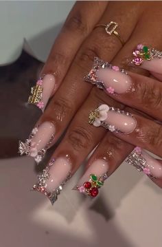 Purple Acrylic Nails With Charms, Black Nails With Hello Kitty Charms, Pink Nail Sets With Charms, Nails With 3d Flowers Charms, Pink Long Nails With Charms