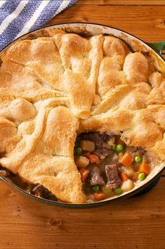 a pot pie filled with meat and vegetables