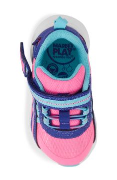 With a machine-washable and easy-on design, this memory foam–cushioned sneaker was built to keep up with your kiddo's rigorous play schedule. Adjustable hook-and-loop closure with elastic laces Memory foam cushioning Synthetic upper and lining/rubber sole Imported American Podiatric Medical Association (APMA) Seal of Acceptance Sporty Breathable Sneakers For Playtime, Sporty Breathable Sneakers For Casual Wear, Playful Non-slip Sneakers For Sports, Sporty Slip-resistant Sneakers For Playtime, Playful Non-slip Sports Sneakers, Sporty Multicolor Slip-resistant Sneakers, Pink Scratch-resistant Sneakers For Sports, Sporty Non-slip Sneakers For Playtime, Pink Slip-resistant Training Sneakers