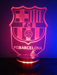 a lamp with the logo of barcelona on it