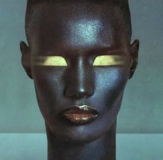 the album cover for grace jones'bulletproof heart, which features an image of a woman with yellow eyes